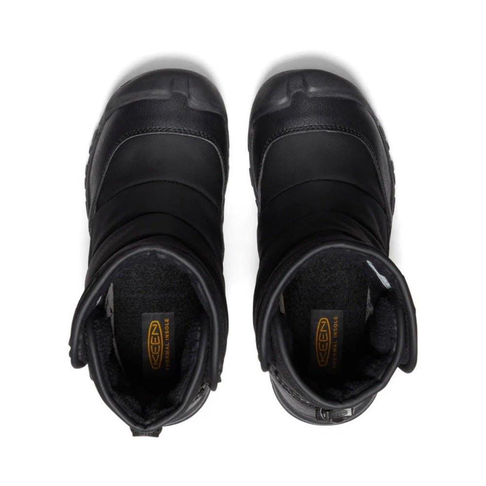 KEEN Big Kids' Puffrider Waterproof Winter Boot Black Steel Grey, top-down view shows plush lining and rugged sole.