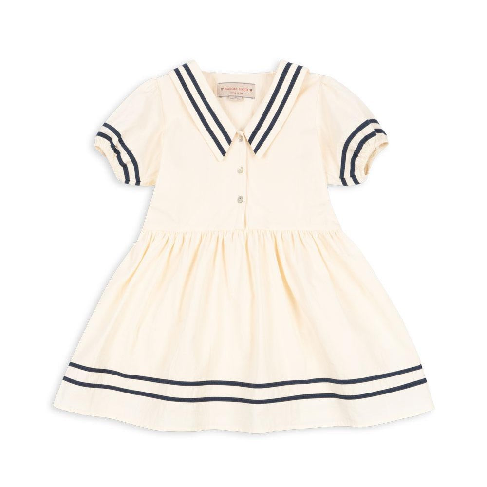 Konges Slojd Allie Sailor Dress optic white with navy collar and cuffs, puff sleeves, gathered skirt