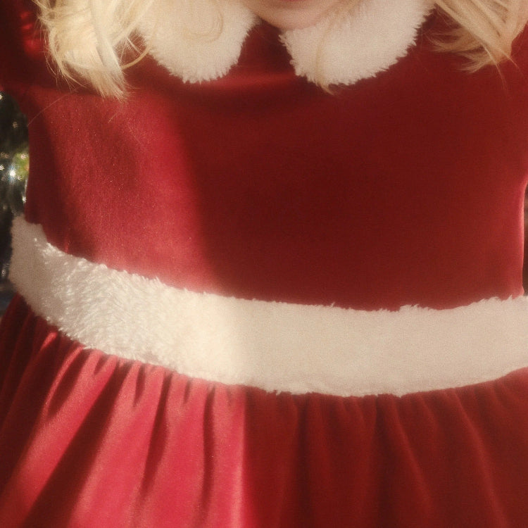 Konges Slojd Christmas Dress Red Dahlia, cozy red velvet toddler dress with white faux‑fur trim at waist and collar.