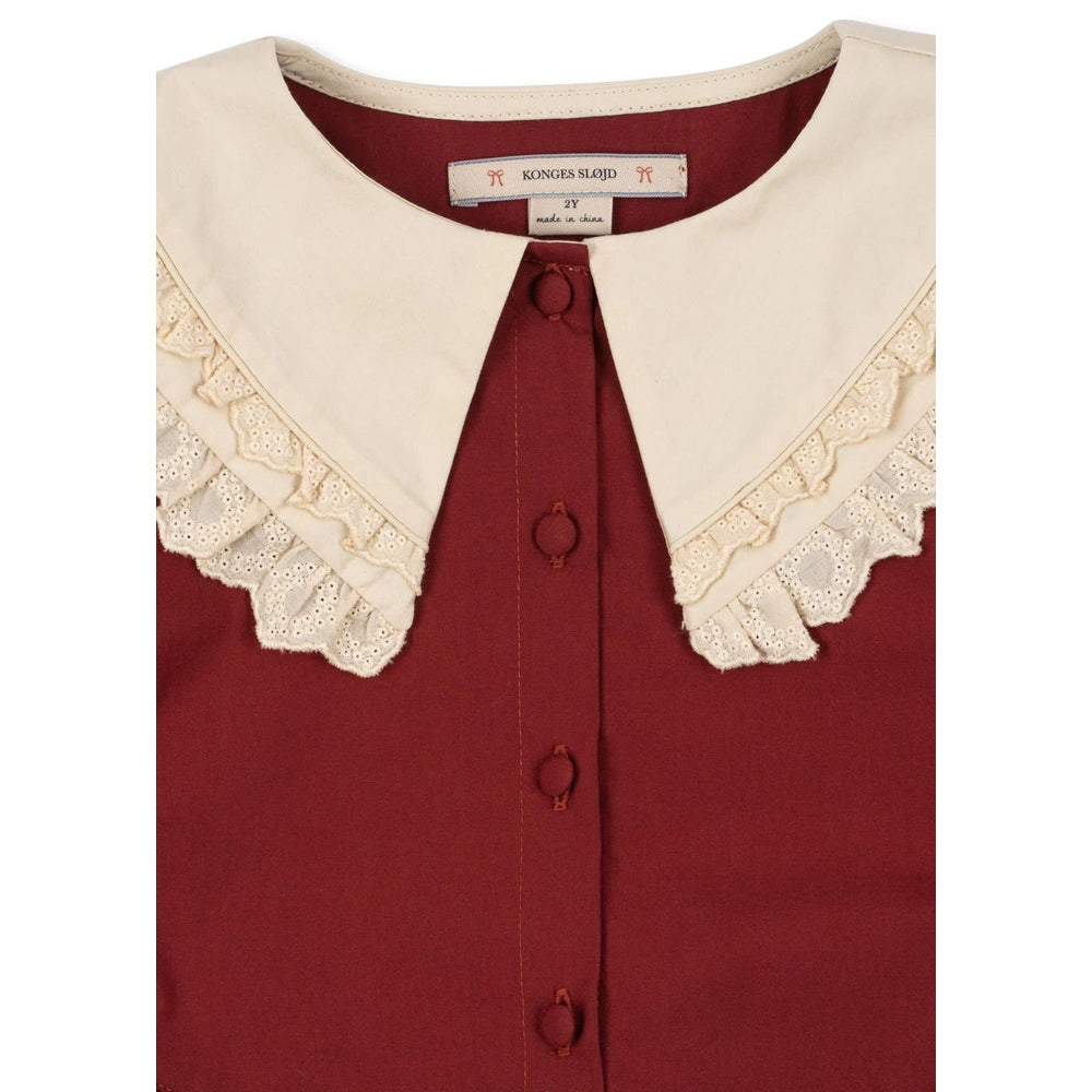 Konges Slojd Coeur Dress Red Dahlia, ivory lace collar, front button placket with scalloped trim.