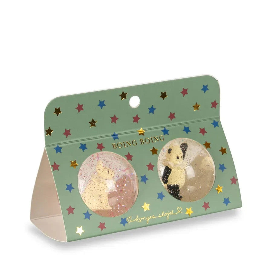 Konges Slojd Glitter Bouncing Ball Set Bunny/Panda; mint card shows two glittery clear bouncy balls.