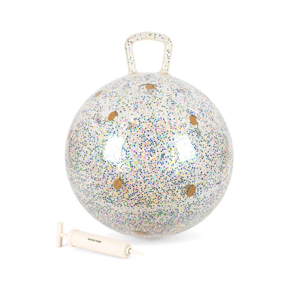 Konges Slojd Glitter Glitter Jump Ball Lemon—glittery white bouncy toy with confetti specks and accompanying pump