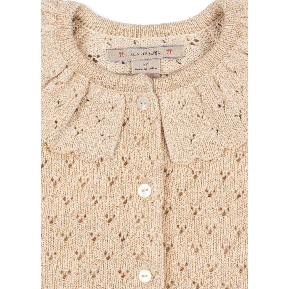 Konges Slojd Holiday Knit Cardigan Buttercream in cream knit with delicate eyelet pattern and front button fastening.