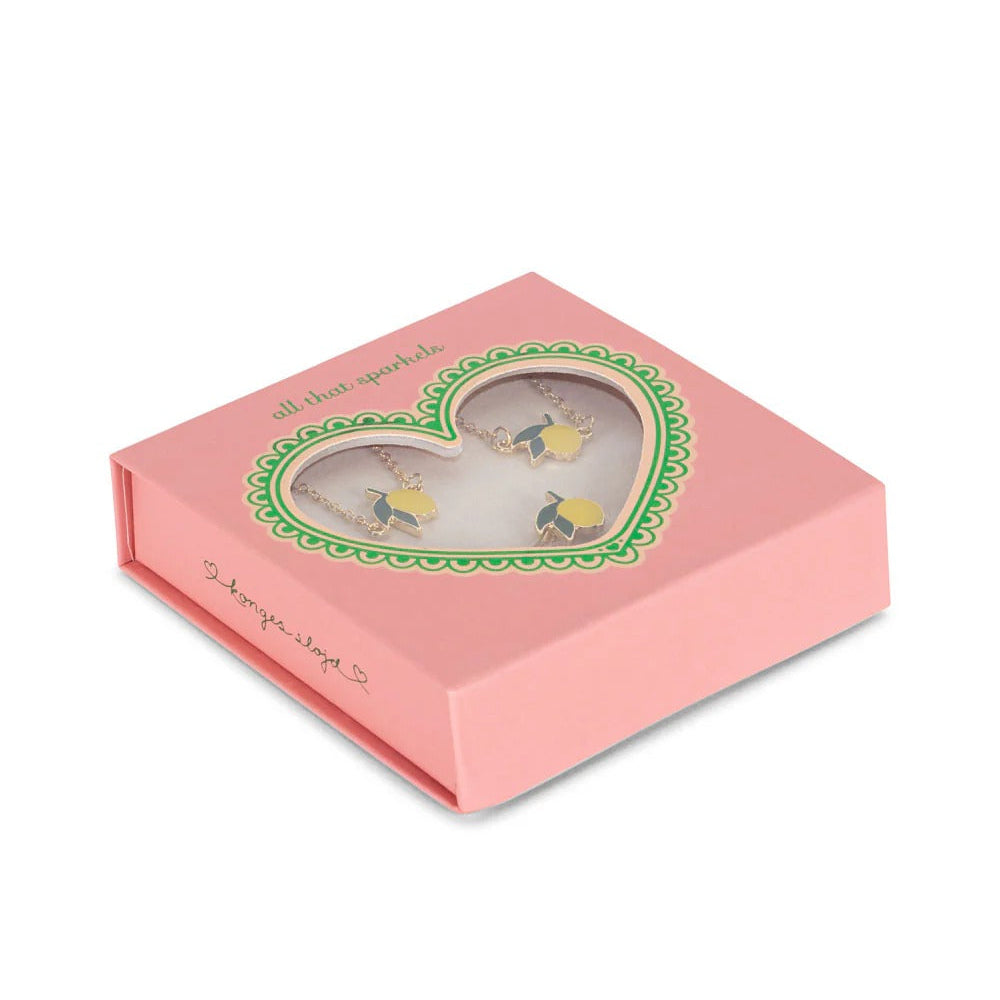 Konges Slojd Jewelry Set in pink box with heart window, showing three turtle pendant necklaces on delicate chains