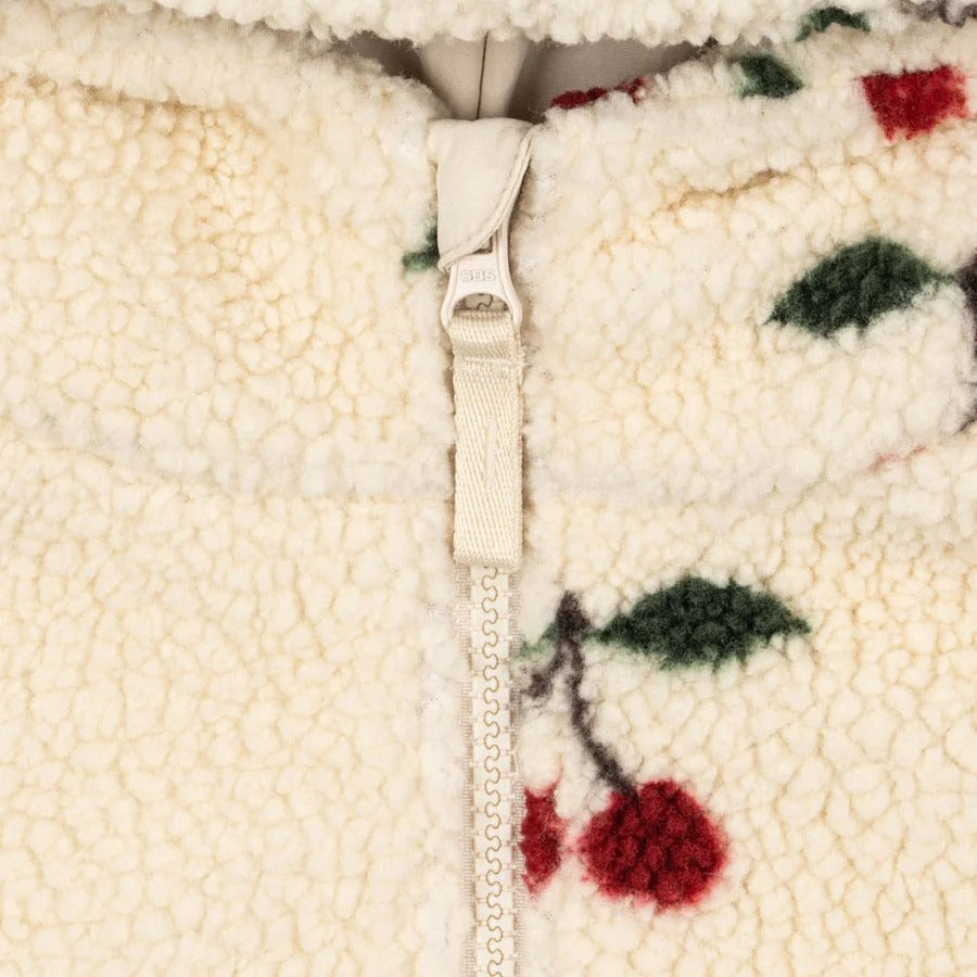 Konges Slojd Jody Teddy Jacket Ma Grande Cerise in cream teddy fleece, cherry accents, featuring a visible zipper.