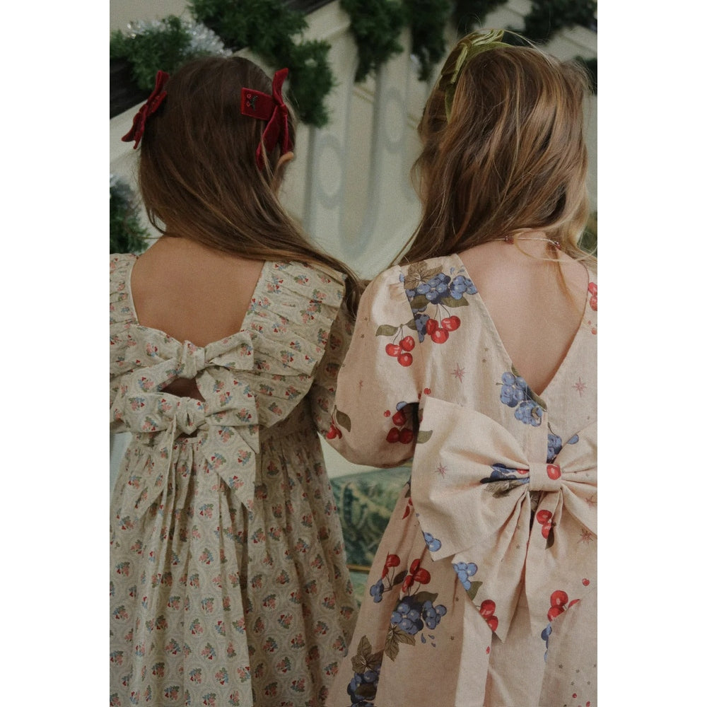 Konges Slojd Juliette Bow Hair Clip 2 Pack Rio Red; two girls wear matching red bow clips at back to secure hair.
