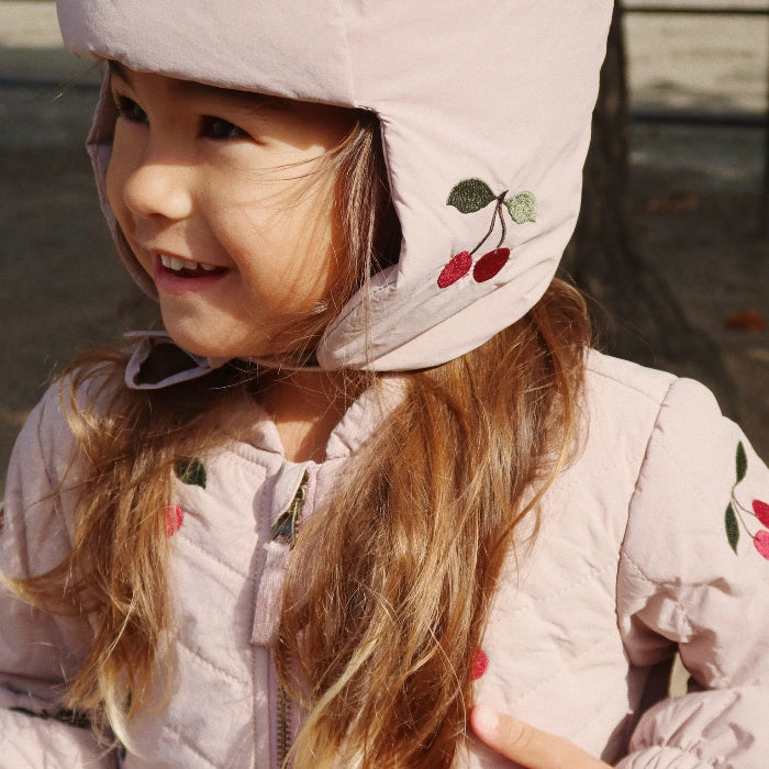 Konges Slojd Juna Bomber Jacket Twilight Mauve, kids’ quilted pink coat with cherry embroidery and hood