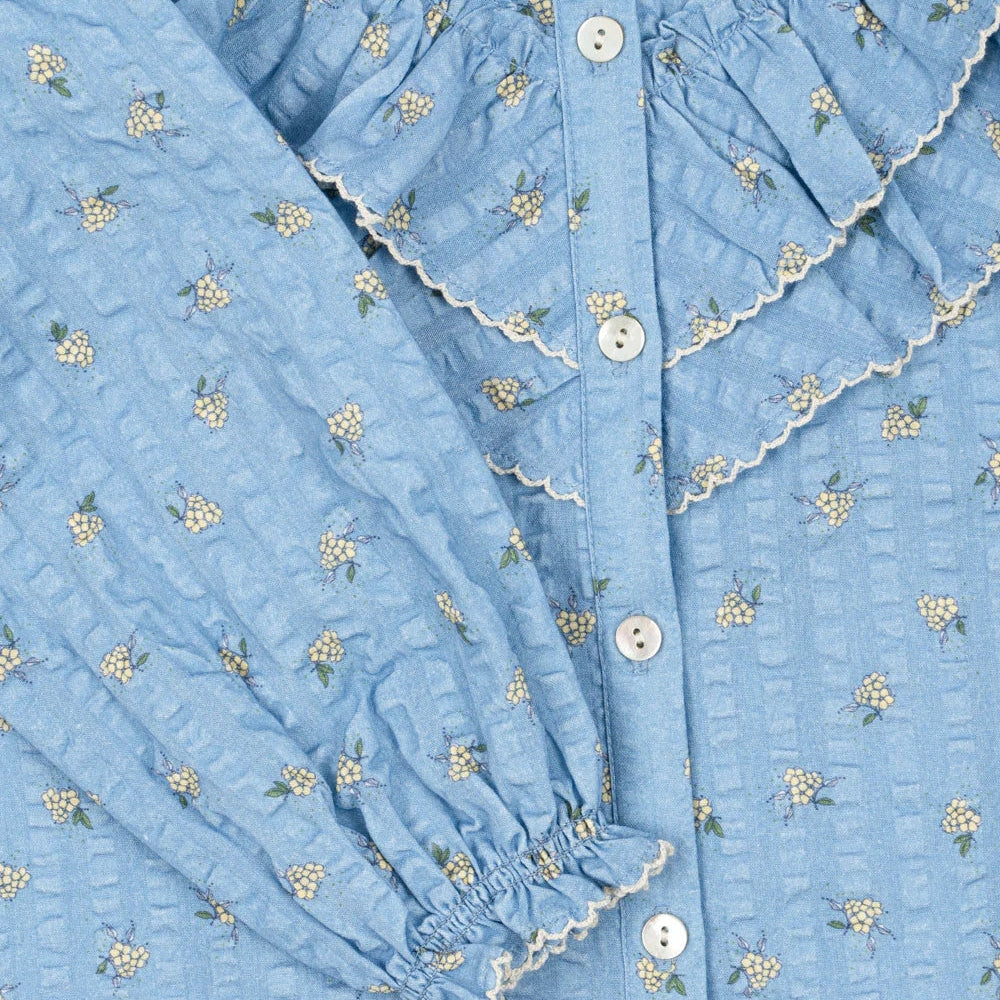 Konges Slojd Kim Frill Blouse Billie Blue, blue cotton top with white lace trim and tiny floral print, button-front.