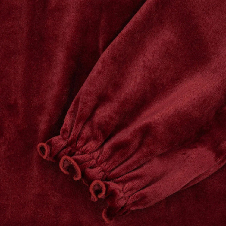 Konges Slojd Venola Dress Red Dahlia—soft velvet fabric with gathered elastic cuffs and decorative loops.