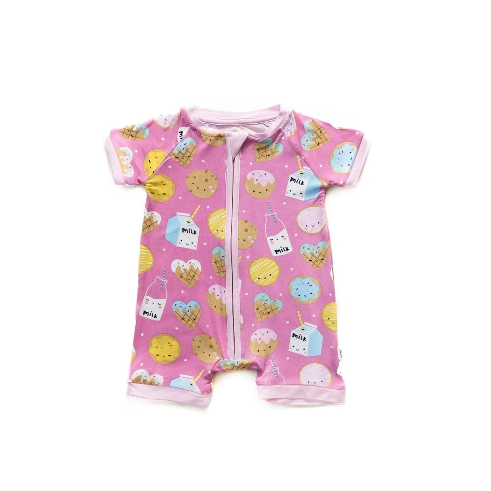 Littlesleepies Pink Cookies & Milk Bamboo Viscose Shorty Zippy romper with pink cookie‑and‑milk pattern and front zipper.