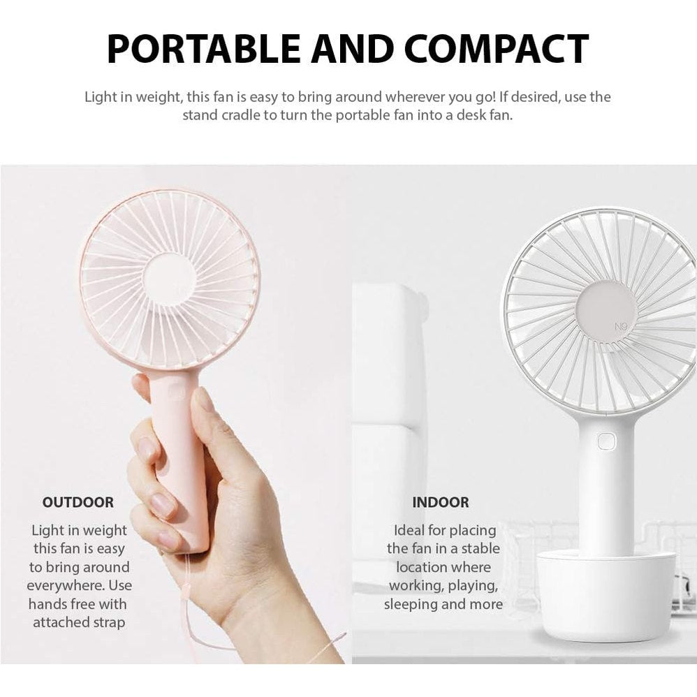 Lumena N9 Handheld Fan Pro Grey, held outdoors with a pink/white variant, illustrating portable indoor and outdoor cooling.