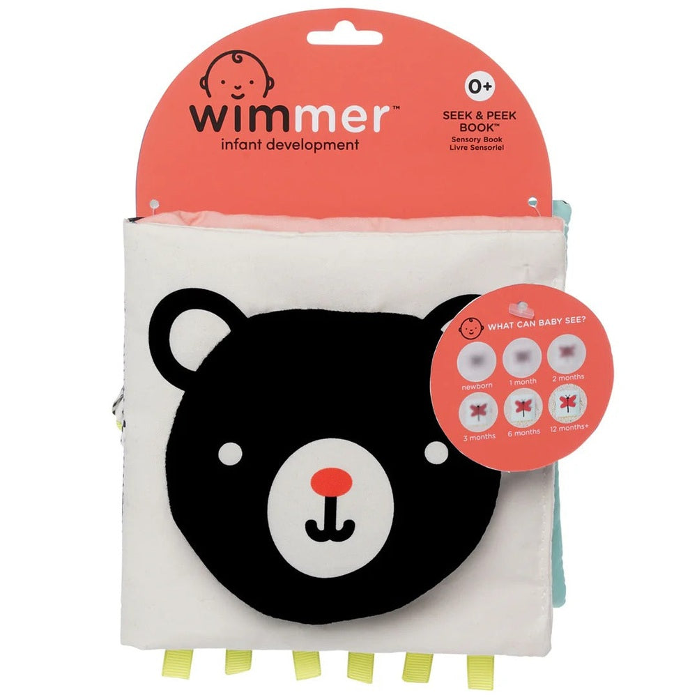 Manhattan Toy Wimmer Seek & Peek Book: soft fabric infant activity book with bear face and yellow ribbon tags.