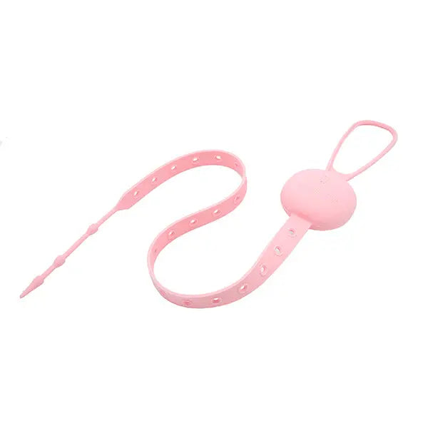 Marcus & Marcus Flip N' Strap pink pacifier clip with adjustable silicone strap securing a pacifier loop.