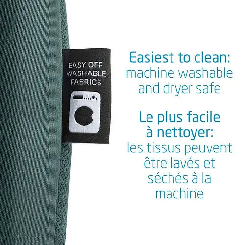 Maxi-Cosi Pria All-In-One Convertible Car Seat in teal fabric; care tag shows machine-washable fabrics.