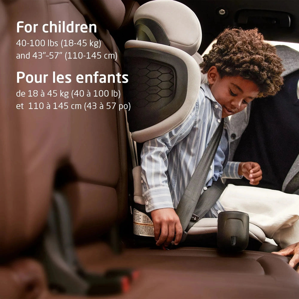 MAXI COSI Tanza Belt-Positioning Booster Car Seat with brown interior; child buckling seat belt.