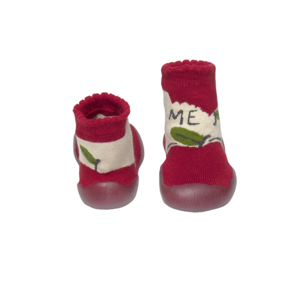 Mayoral newborn baby slipper socks in red with white leaf pattern worn on tiny feet showing soft knit cuffs.