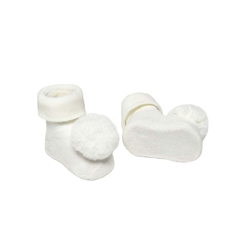 Mayoral Newborn Headpiece And Socks Set Natural, cream knit with fluffy pom-poms, shown laid flat.