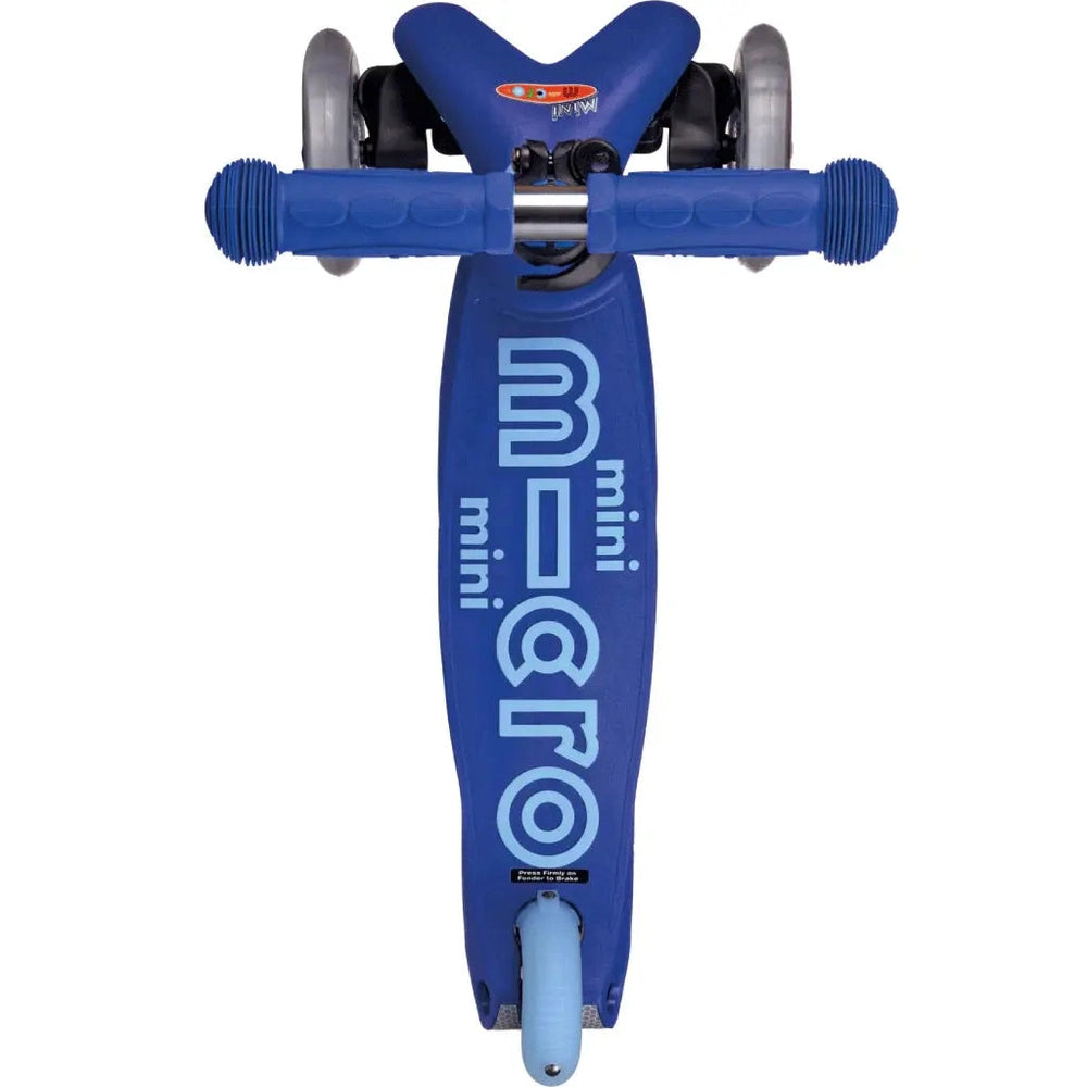 Micro Mini Deluxe Scooter in blue with textured blue grips and bold MICRO branding on the deck.