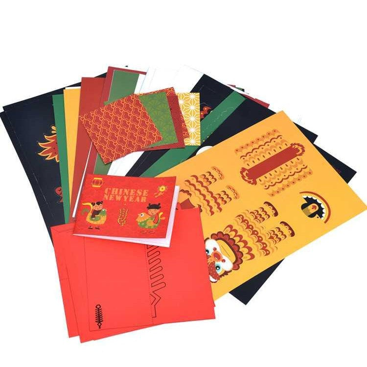 MIDEER Christmas origami paper pack with red, green, yellow sheets and festive patterns