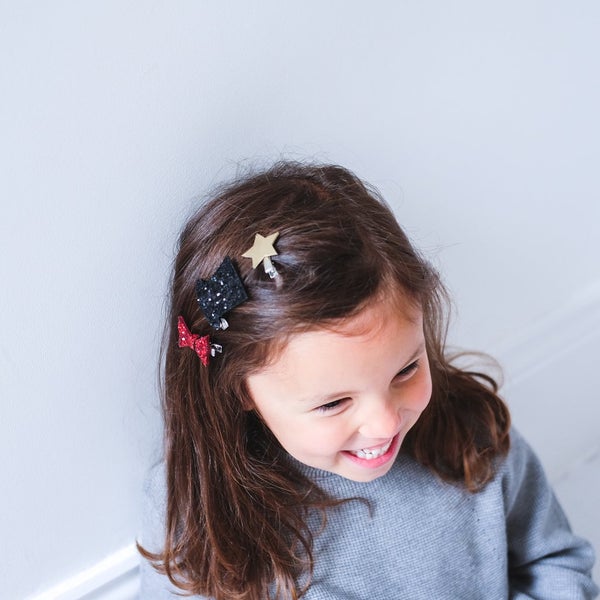 Mimi & Lula Circus Clips Pack; three hair clips in black glitter star, red bow, gold star