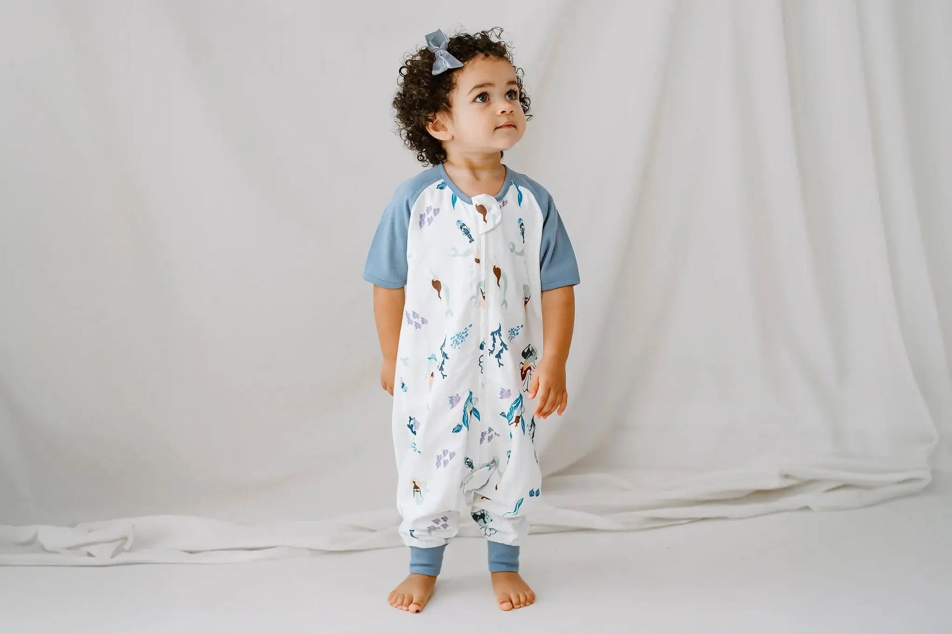 Nest Designs Raglan Bamboo Pima Short Sleeve Footed Sleep Bag 0.6 Tog Splish Splash