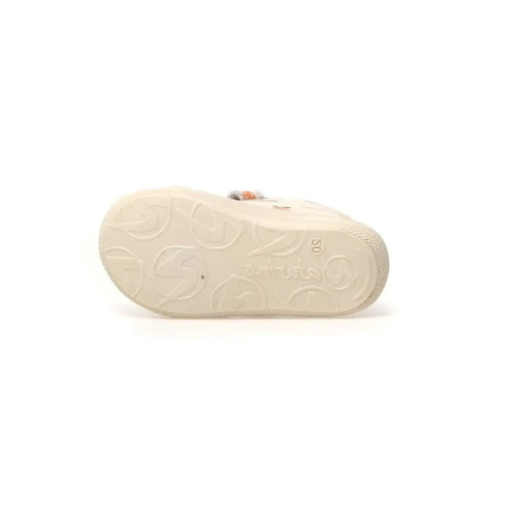Naturino Cocoon Vl White Peach baby shoe—cream sole with embossed tread pattern visible.