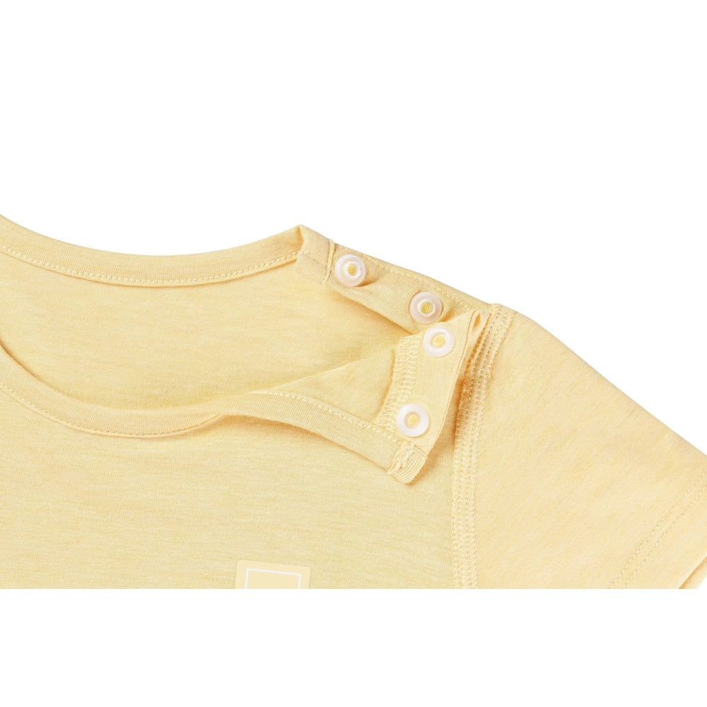 Nest Designs Bamboo Jersey Short Sleeve T-Shirt Pantone Sunset Gold, pale yellow knit showing three shoulder snaps fastening the placket