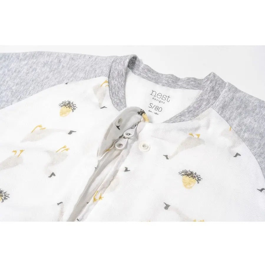 Nest Designs Bamboo Long Sleeve Footed Sleep Bag The Goose & The Golden Egg white with gray heather sleeves and pineapple print, 1.0 Tog