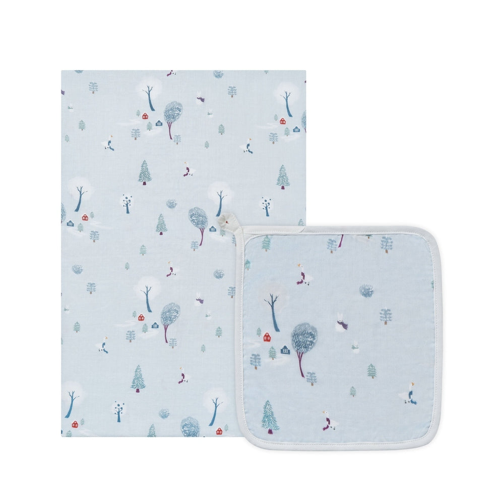 Nest Designs Bamboo Muslin Small Nesting Blanket 120cm x 120cm, light blue with whimsical tree pattern shown.