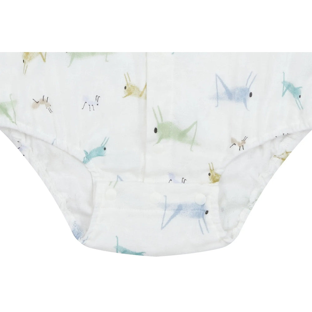 Nest Designs Bamboo Pima Sleeveless Button-Down Onesie featuring colorful ants and grasshoppers, laid flat.