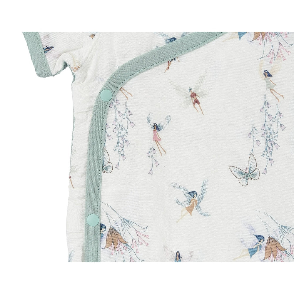 Nest Designs Bamboo Short Sleeve Kimono Onesie Fairy Tale print in white with mint trim, front snap closures shown.