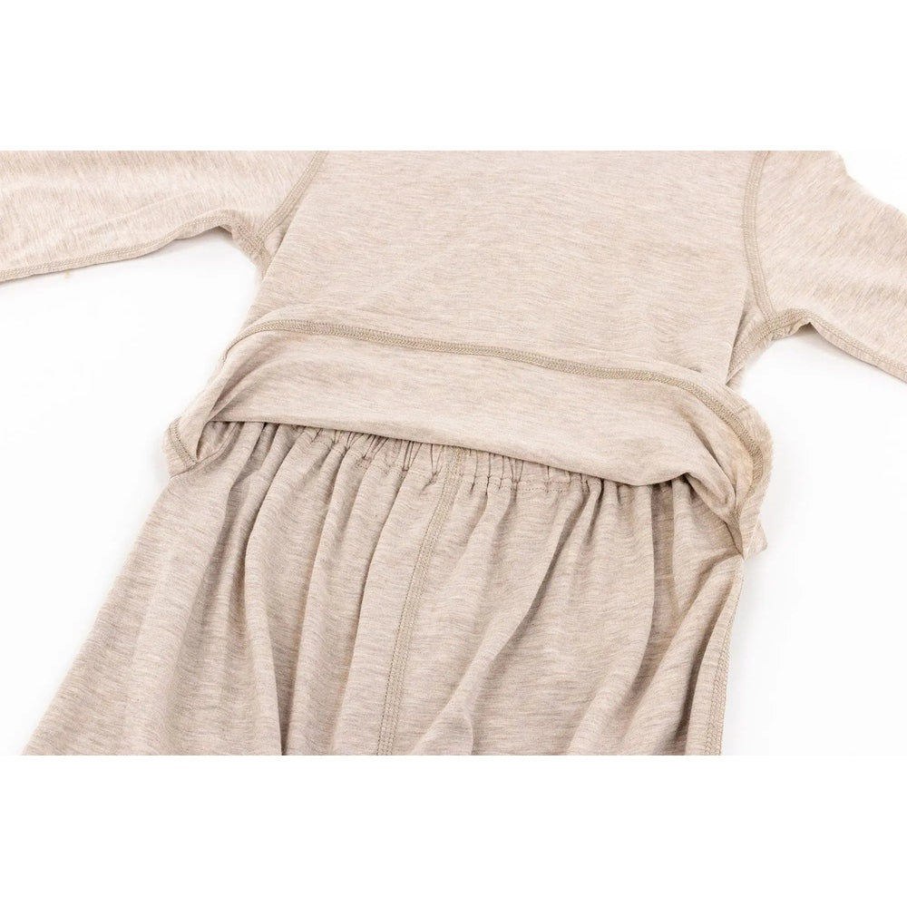 Nest Designs Basics bamboo cotton long-sleeve drop-bottom romper in warm taupe, laid flat with elastic waist.