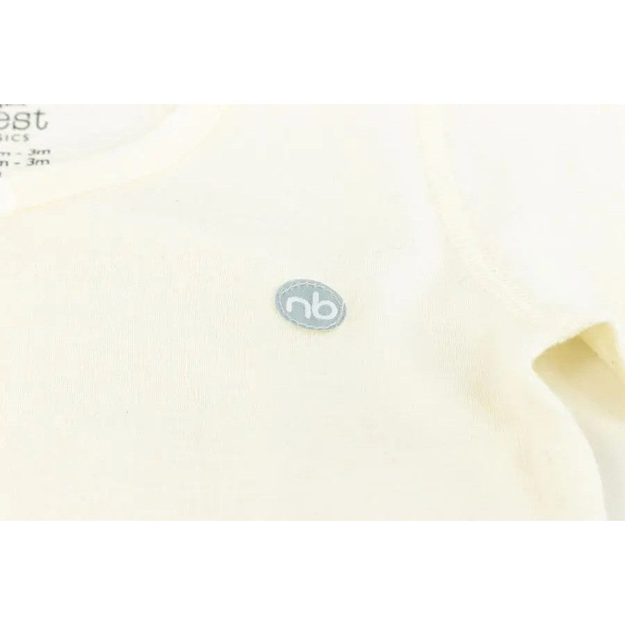 Nest Designs Basics Organic Cotton Ribbed Kimono Long Sleeve Onesie, white, 3-pack; flat lay shows soft ribbed knit and blue logo badge.