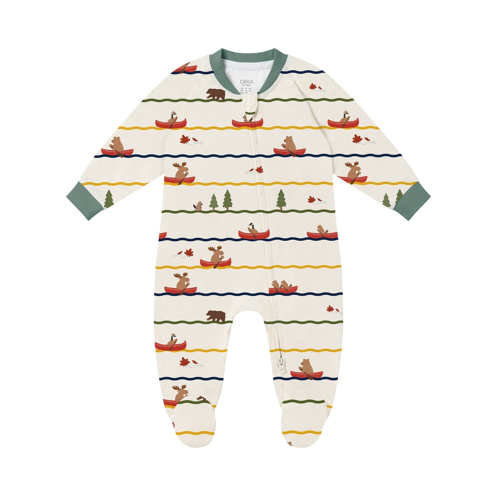 Nest Designs Long Sleeve Footed Sleeper Canoe Do It in cream with boats and moose; green cuffs and front zipper.