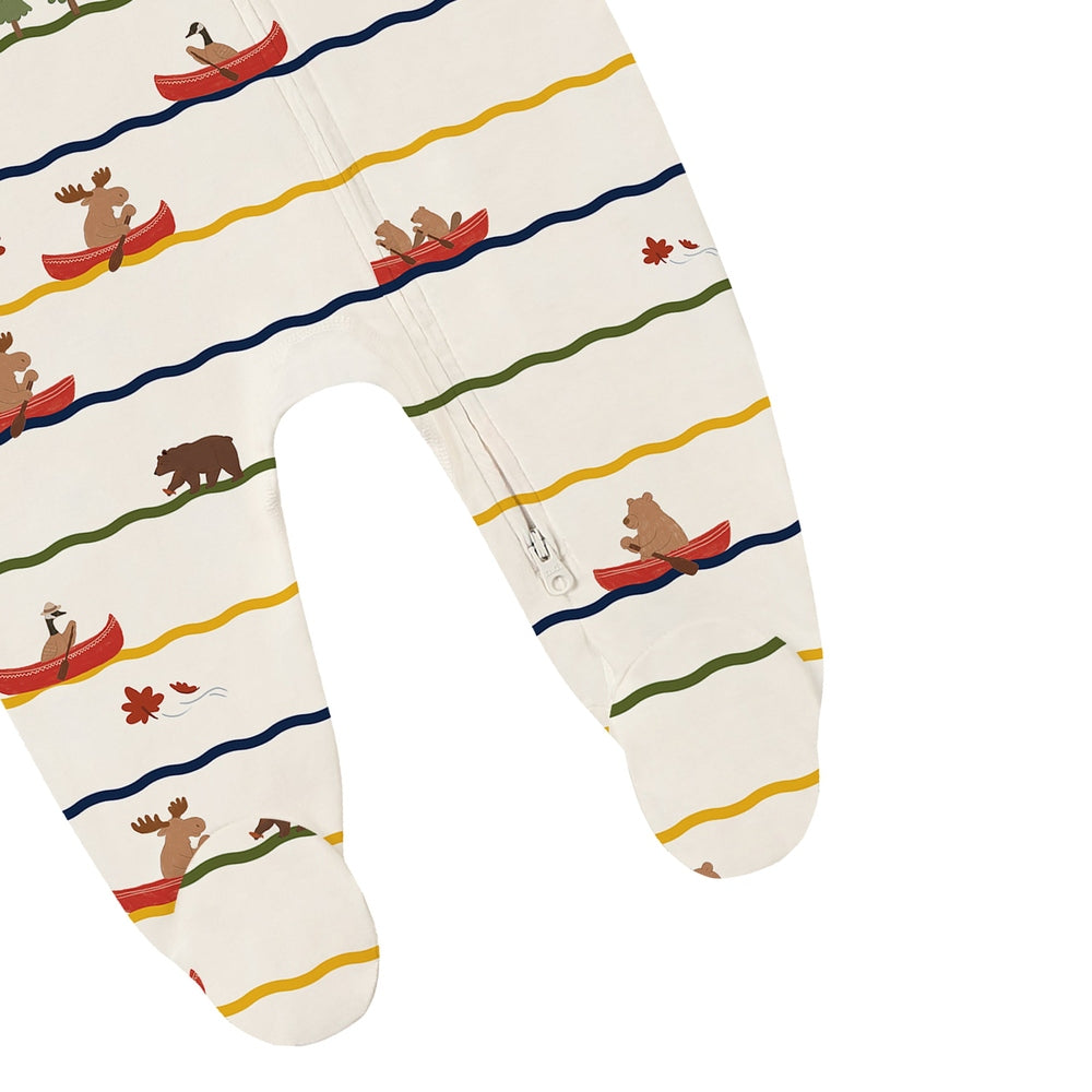 Nest Designs Long Sleeve Footed Sleeper Canoe Do It in cream; bears paddling in red canoes along colorful waves, zipper front.
