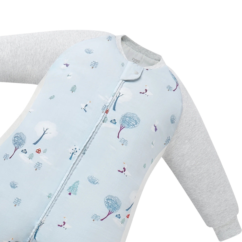 Nest Designs Raglan Bamboo Footed Sleep Bag 2.5 Tog Snowy Snuggles in pale blue with grey sleeves and front zipper.