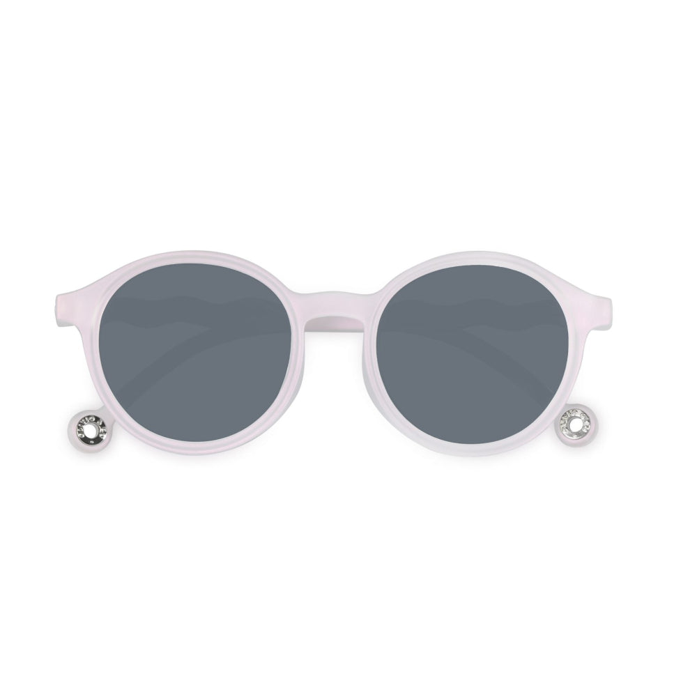 Olivio & Co Oval Sunglasses Adult in pink shimmer frame with gray lenses, crystal accents visible.