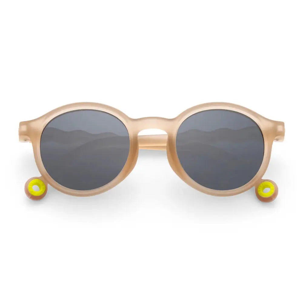 Olivio & Co Oval Sunglasses Junior+ Classic Olivio Sand Beige frames with gray lenses on white background