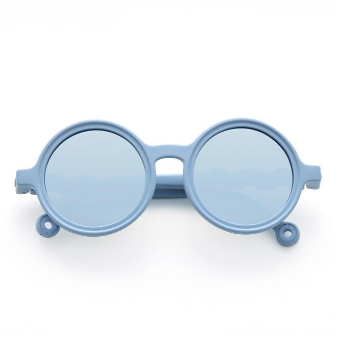 OLIVIO & CO Round Sunglasses Kids Classic Olivio Glacier Blue, round frames with blue lenses resting flat.