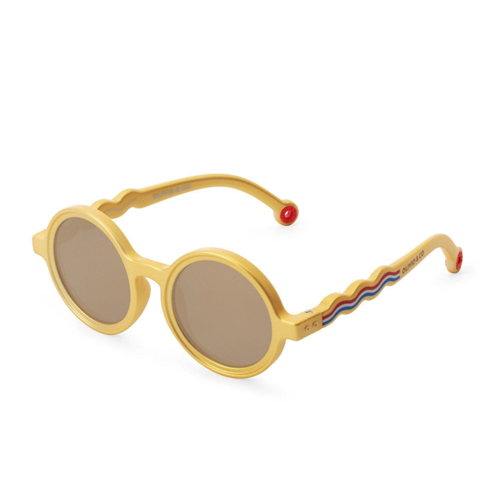 Olivio & Co Round Sunglasses Kids Medallion Gold frame with brown lenses, wavy striped arms.