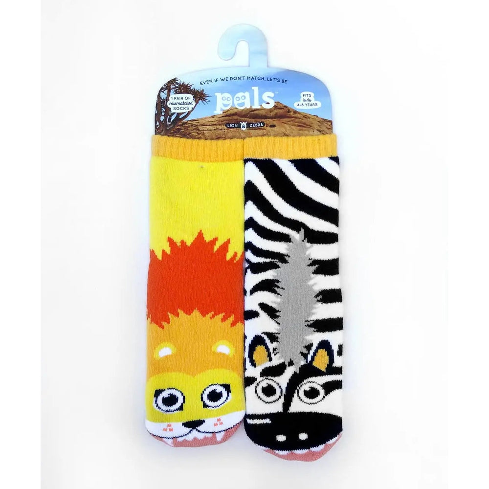 Pals Socks Lion & Zebra mismatched socks, bright yellow lion and zebra-striped pair worn side by side.