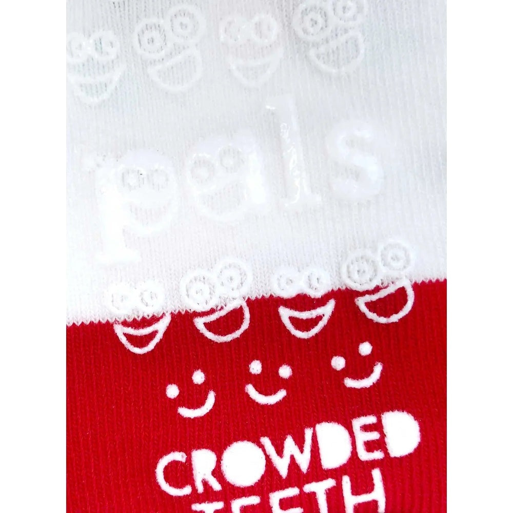 Pals Socks Milk&Cookies Crowded Teeth mismatched socks, white cuff with embossed smiley rings and red foot with white faces.