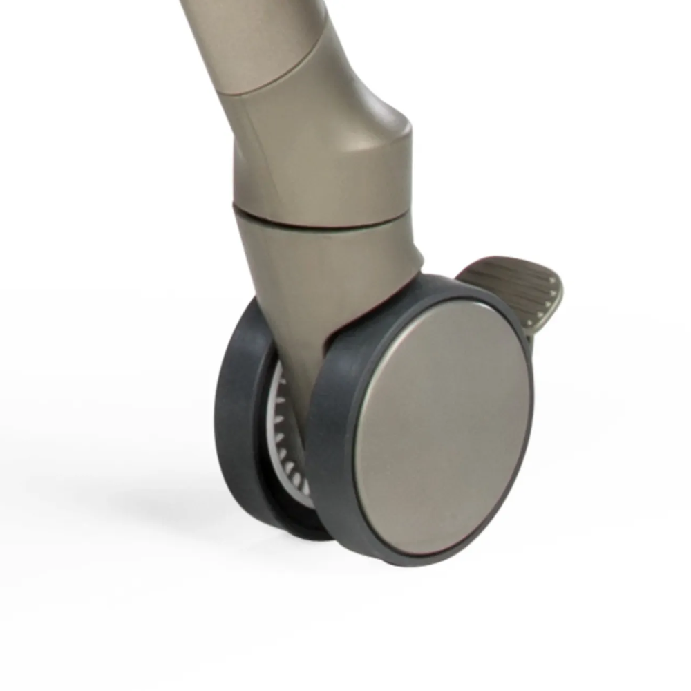 Peg Perego Living High Chair leg with large grey caster wheel and beige finish.