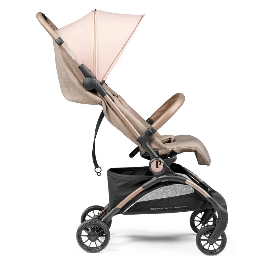 Peg Perego VOLO Travel Stroller in beige with extended sun canopy, adjustable handle, and sturdy wheels