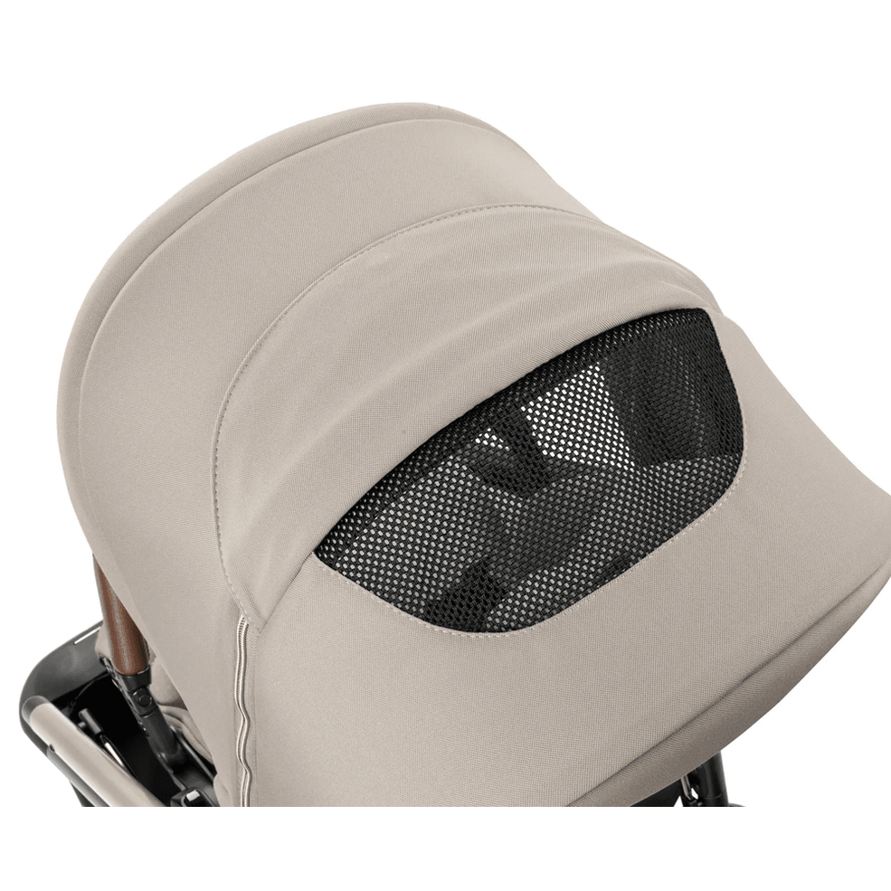 Peg Perego Velcoe TC Stroller beige canopy with mesh window, showcasing breathable sunshade and sturdy frame.