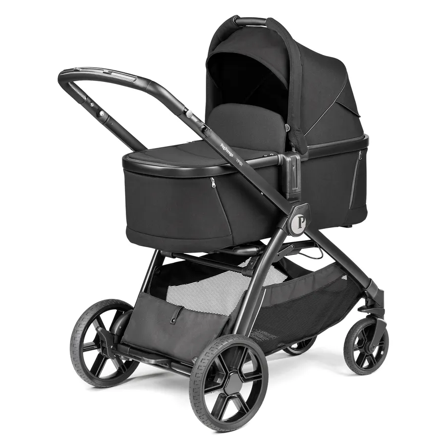 Peg Perego YPSI Stroller with bassinet in black, sturdy frame and large wheels for smooth rides.