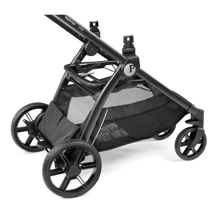 Peg Perego YPSI Travel System stroller in black, folded frame shown with mesh storage basket.