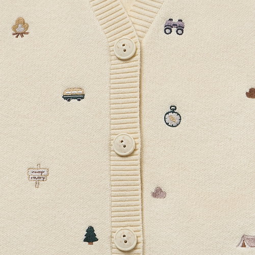 Petite Revery cotton knit vest in cream with ribbed front placket and tiny embroidered icons