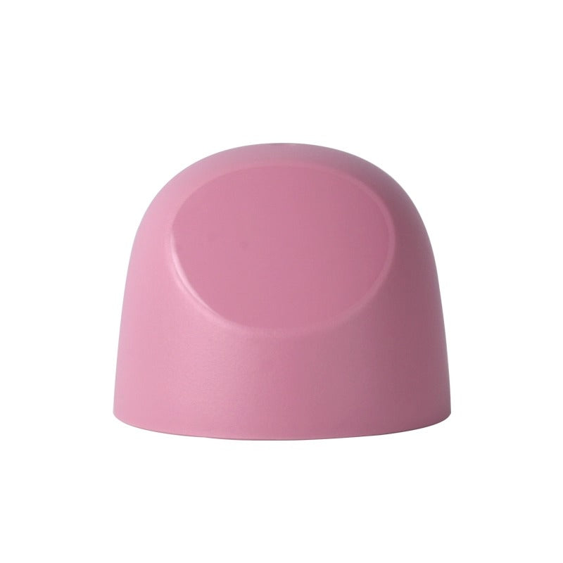 Pigeon Baby Bottle Hood in pink plastic, curved cap shown isolated on white background.