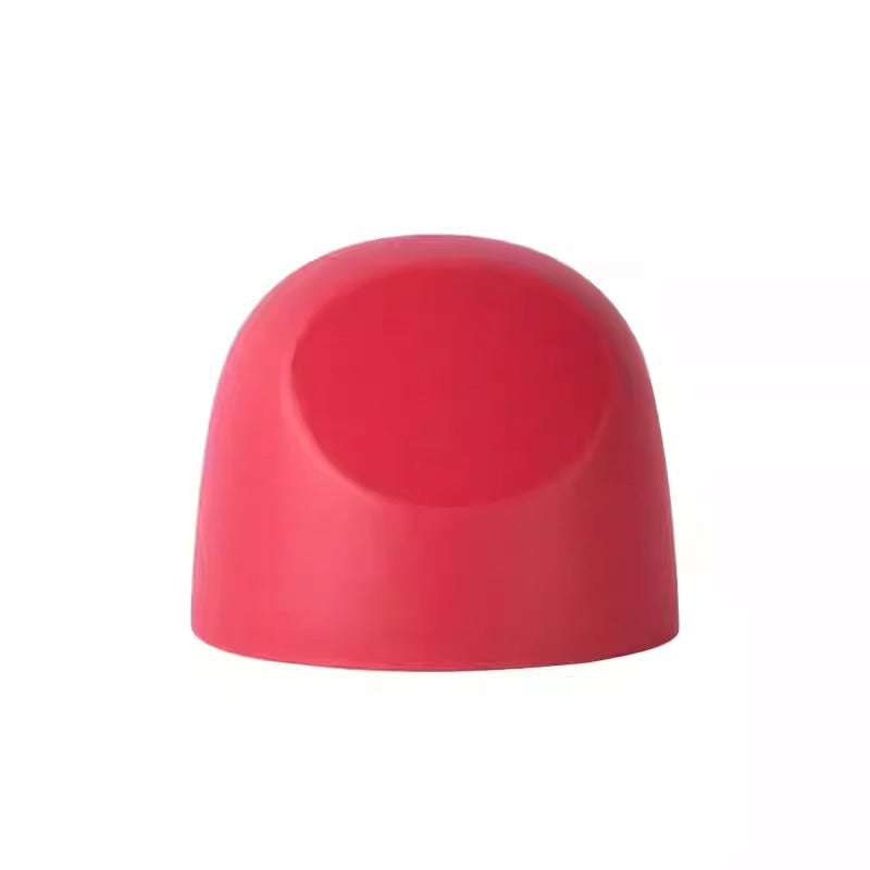 Pigeon Baby Bottle Hood in pink silicone, smooth dome shape designed to fit over a nipple.